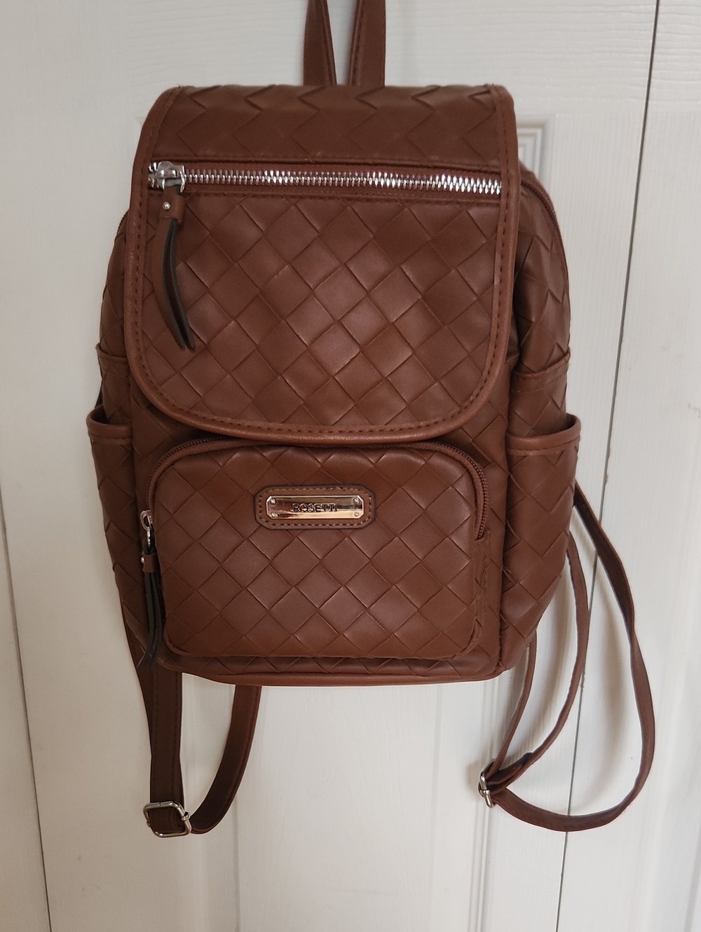 Rosetti Woven Brown Faux Leather Backpack with Gold Plaque